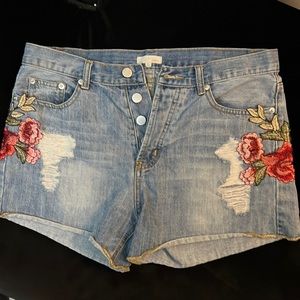 Embroidered rose denim shorts